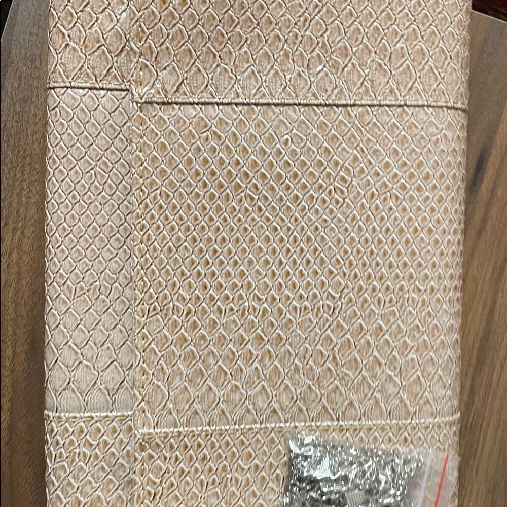 Animal textured skin clutch